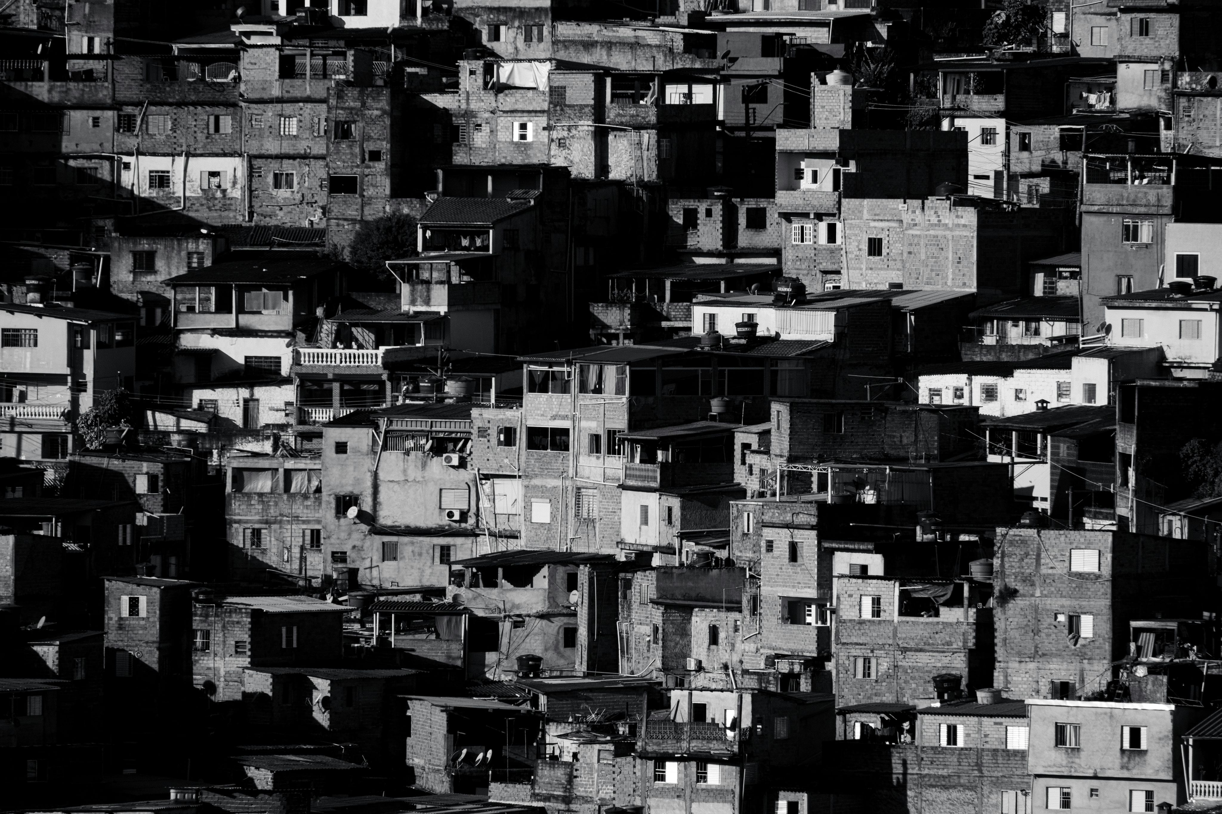 a black and white photo of a bunch of buildings